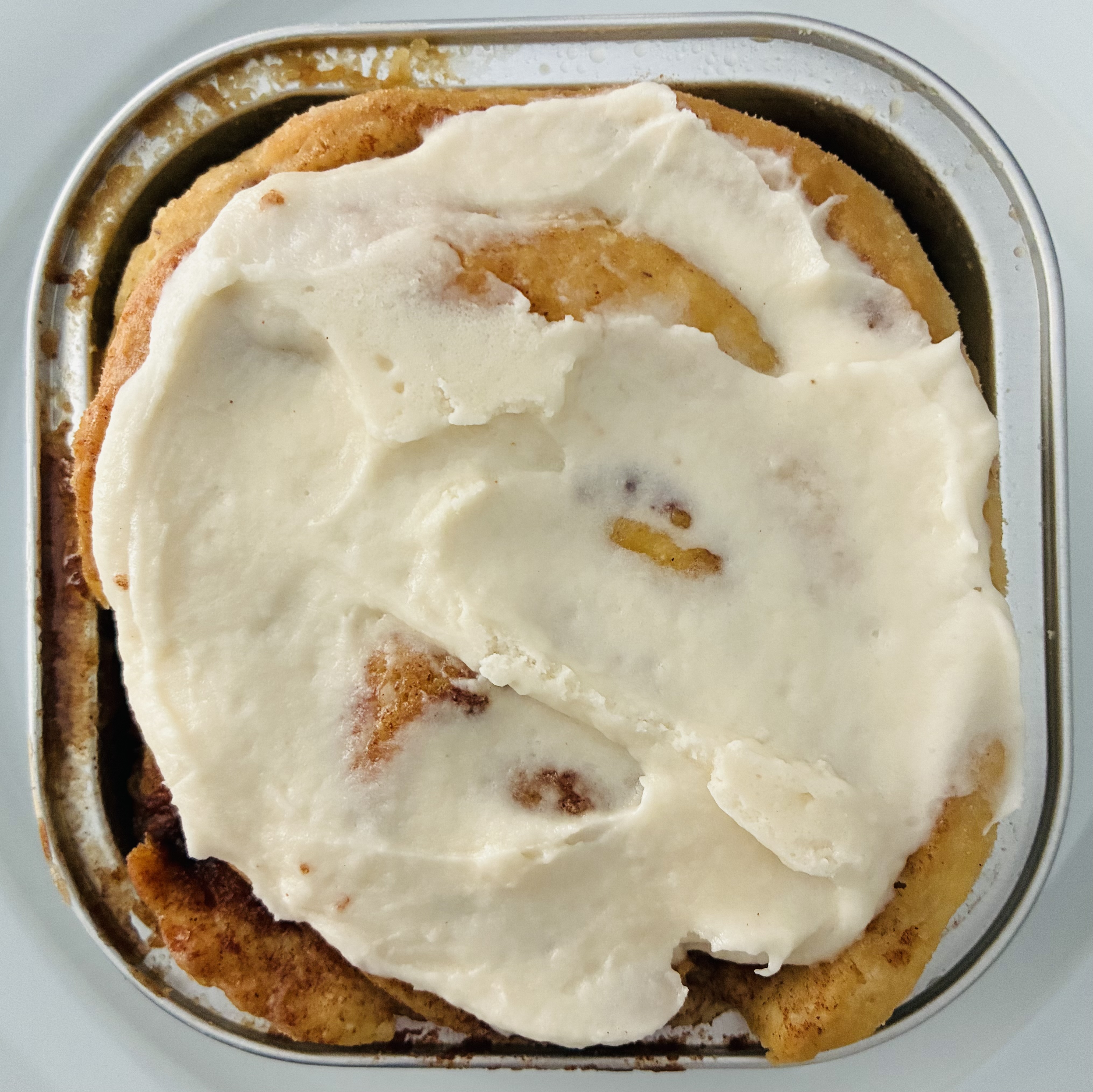 A pan of classic cinnamon rolls with glaze